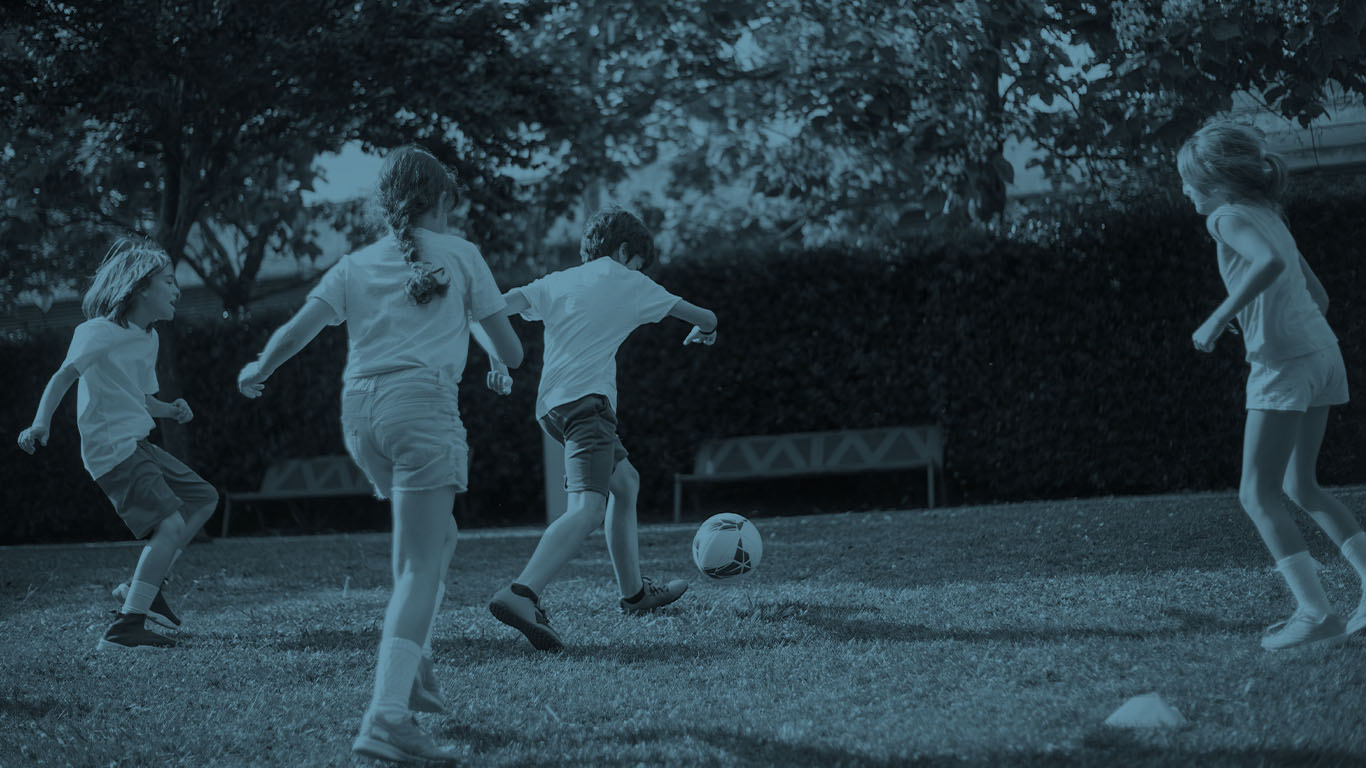 Kids playing football
